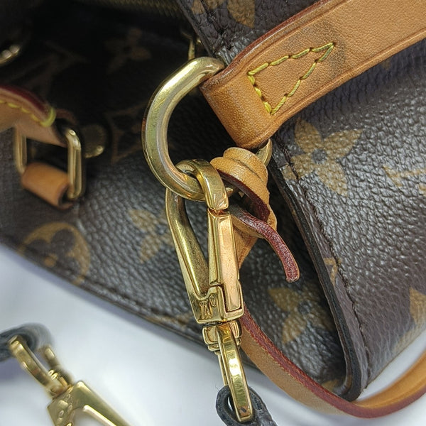 MONTAIGNE GM Monogram Coated Canvas Brown