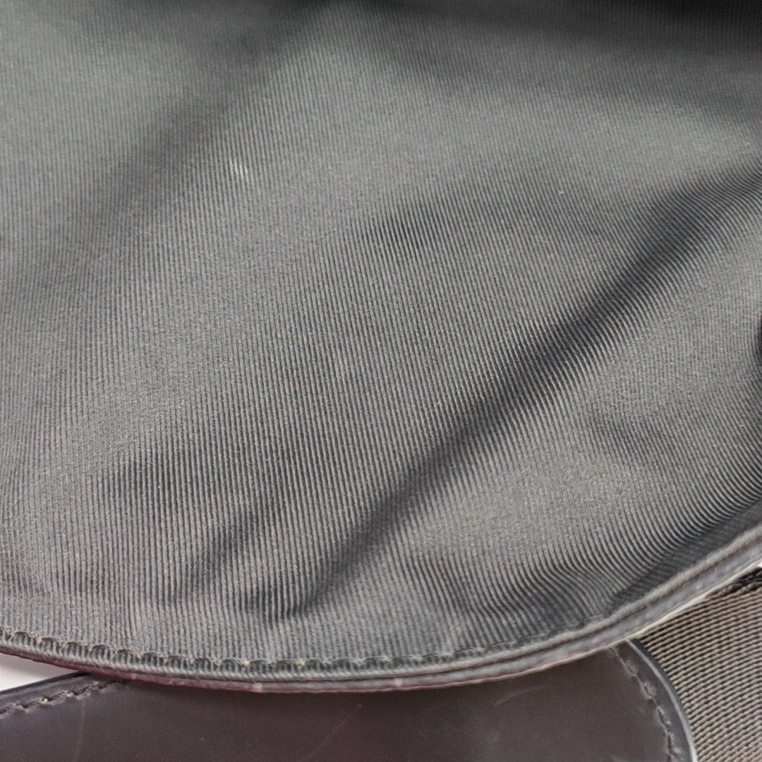 VOYAGER PM Monogram Coated Canvas Black