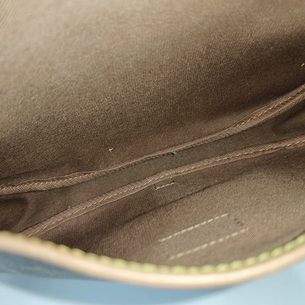 SAUMUR 30 Monogram Coated Canvas Brown
