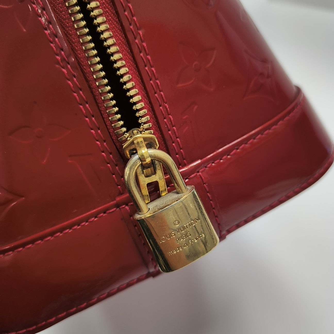 ALMA GM Monogram Calfskin Red