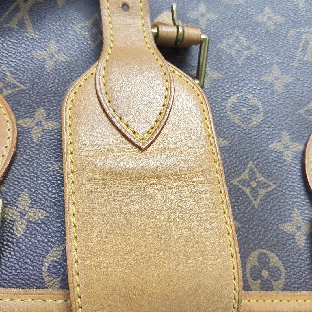 VINTAGE RIVOLI Monogram Coated Canvas Brown