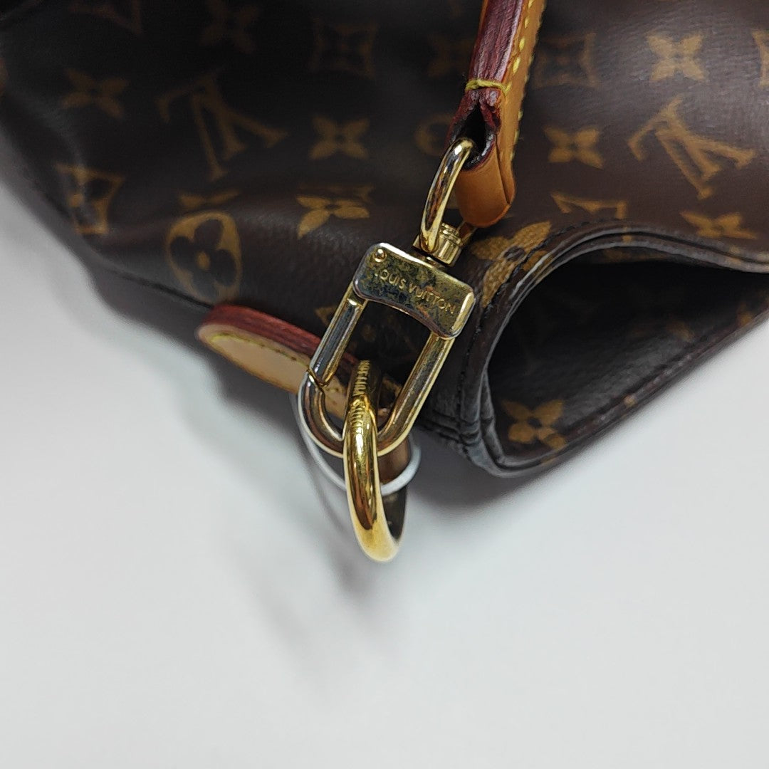 MELIE Monogram Coated Canvas Brown