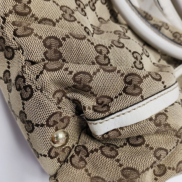 D-Ring Monogram Canvas Brown