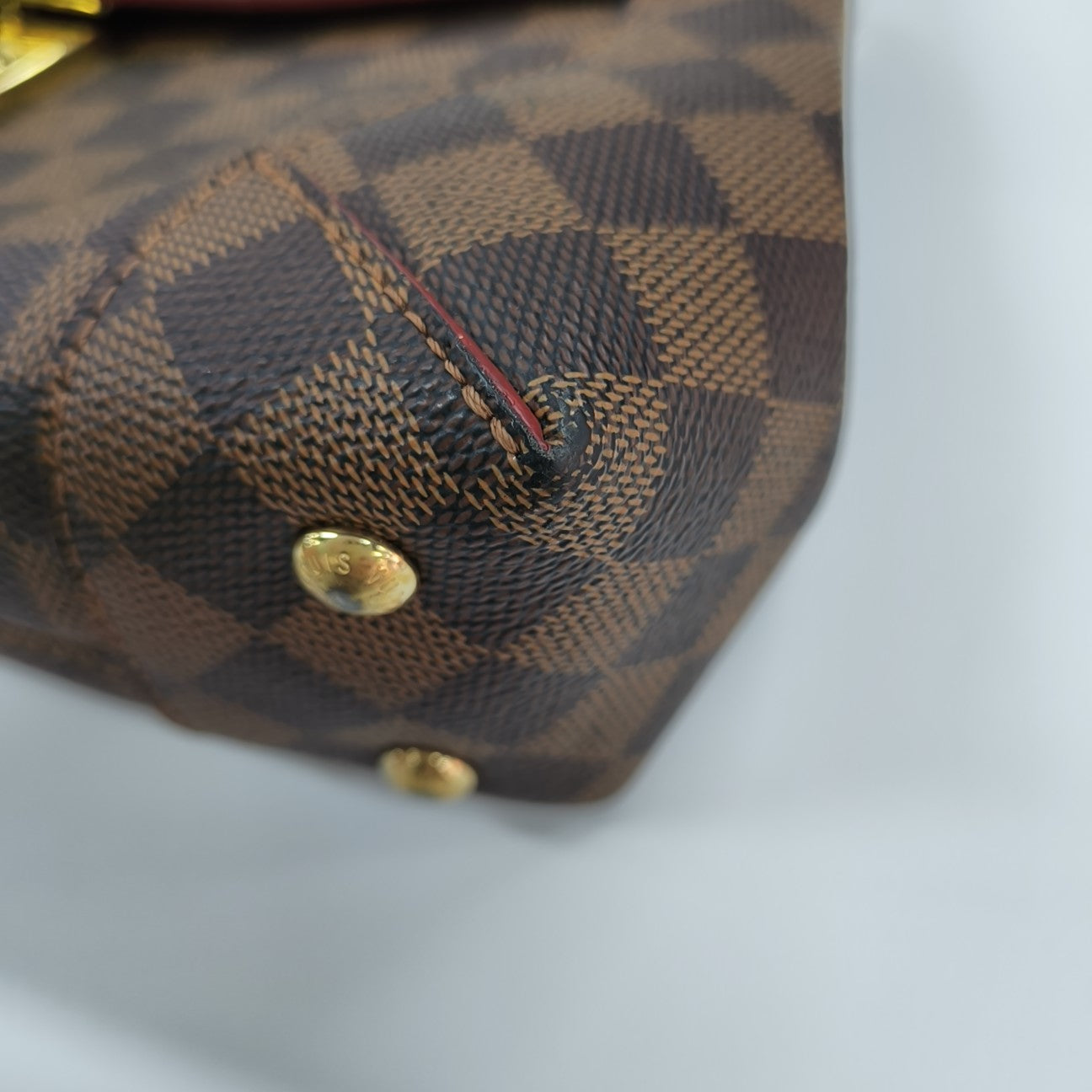 CAÏSSA Damier Ebene Coated Canvas Brown
