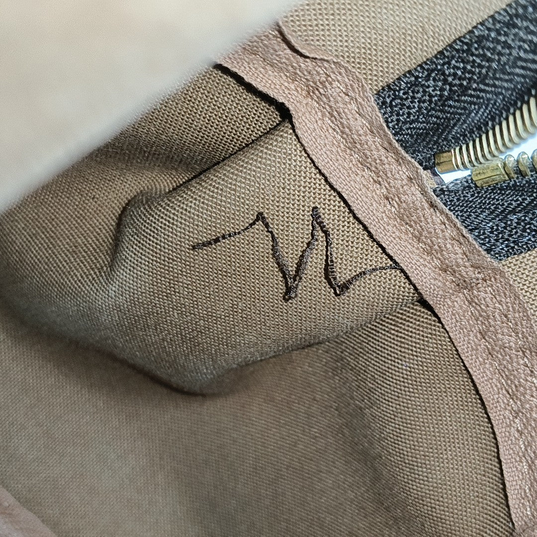 MONTORGUEI Monogram Coated Canvas Brown