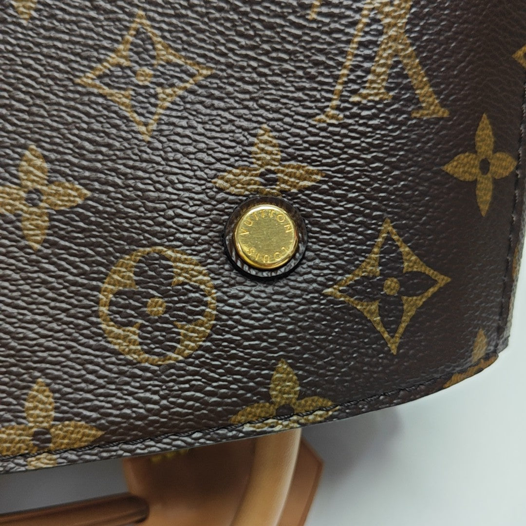 MONTAIGNE Monogram Coated Canvas Brown