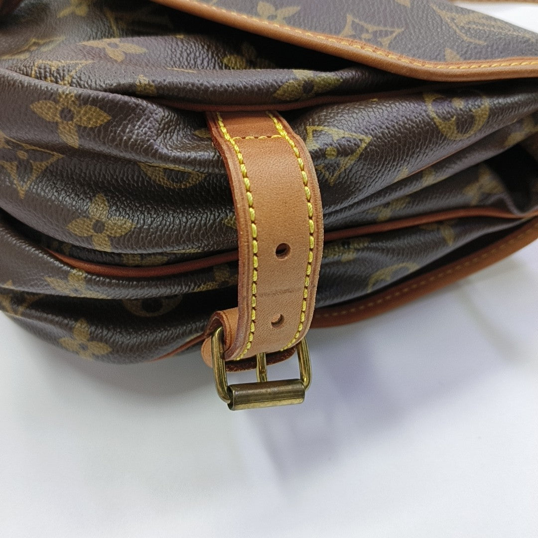 SAUMUR Monogram Coated Canvas Brown