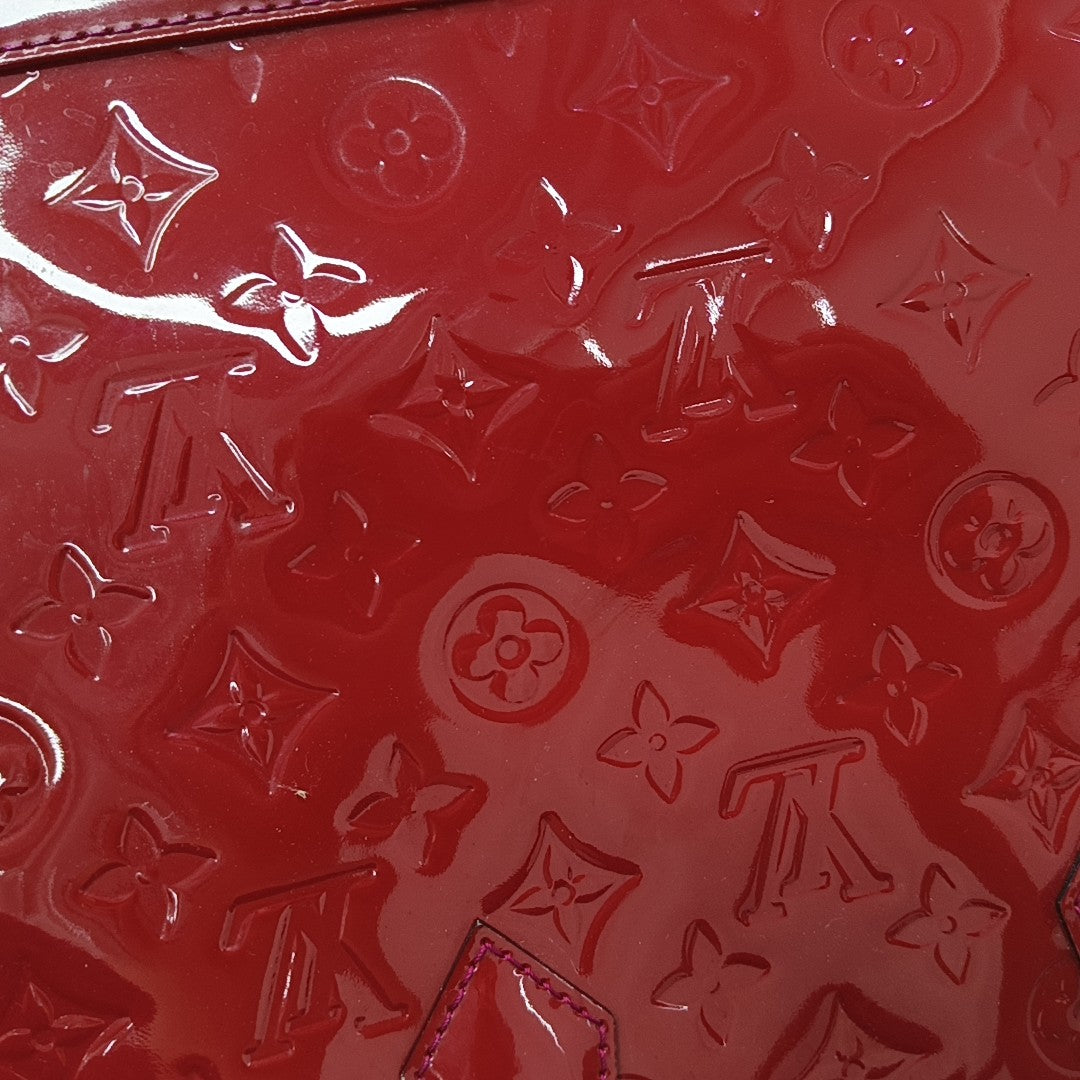 ALMA PM Piel Charol Monogram Roja
