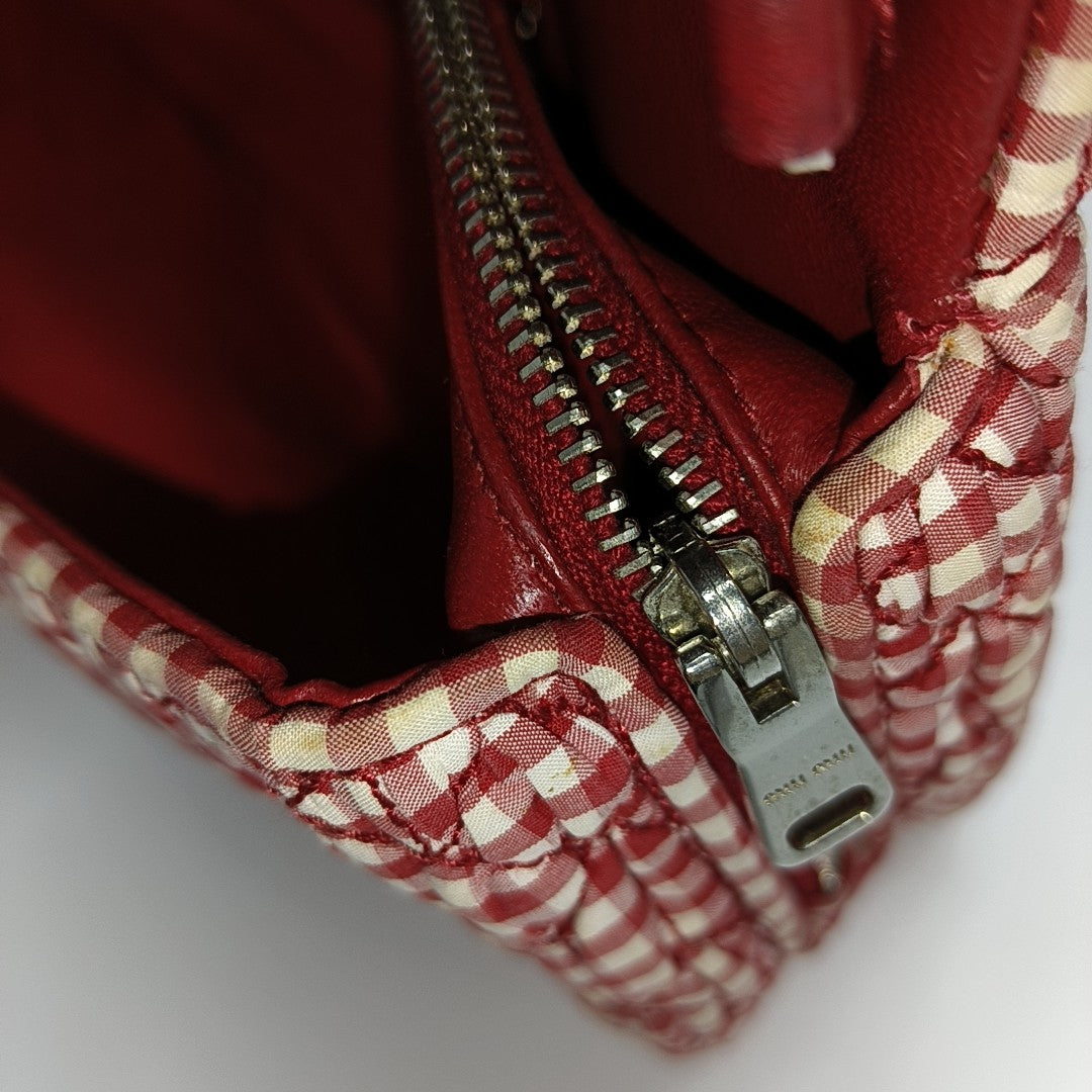 Bolso bandolera de tela acolchada rojo