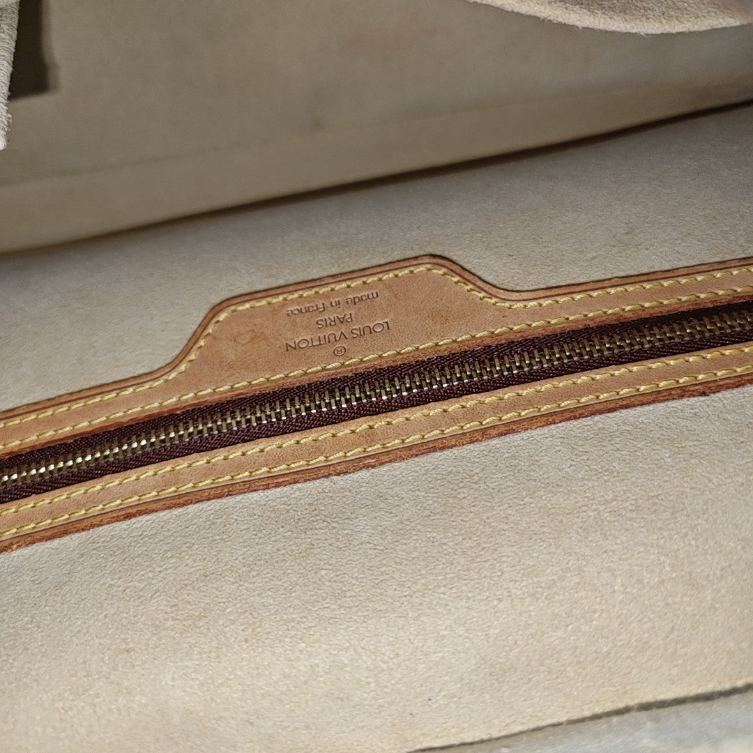 CITE GM Monogram Coated Canvas Brown
