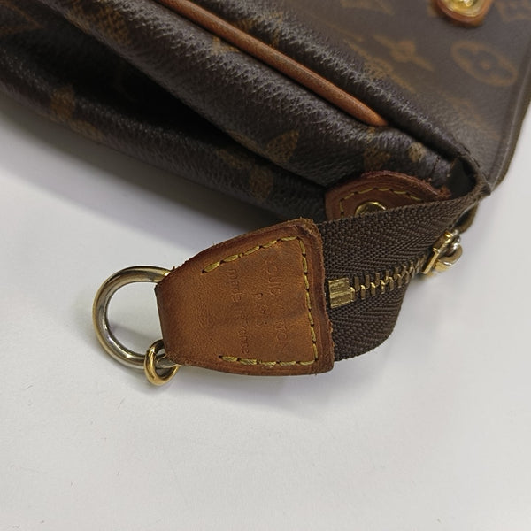 EVA Monogram Coated Canvas Brown