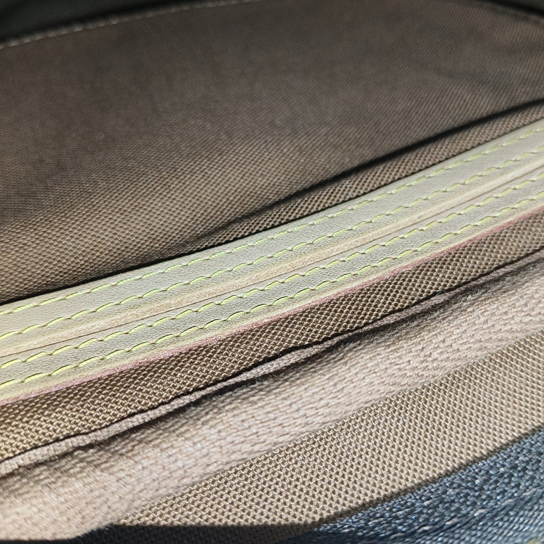 MONTORGUEI PM Monogram Coated Canvas Brown