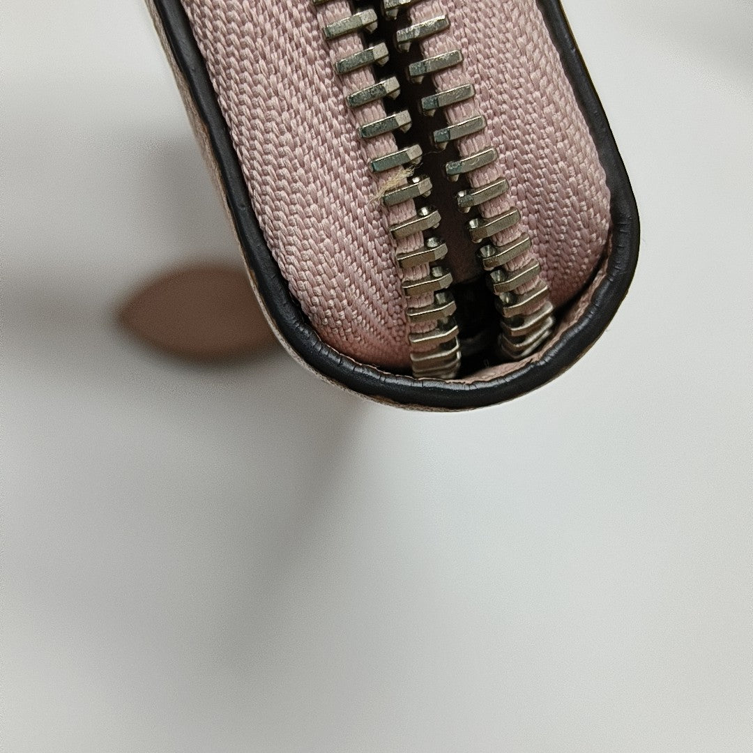 ZIPPY Monogram Calfskin Pink Wallet