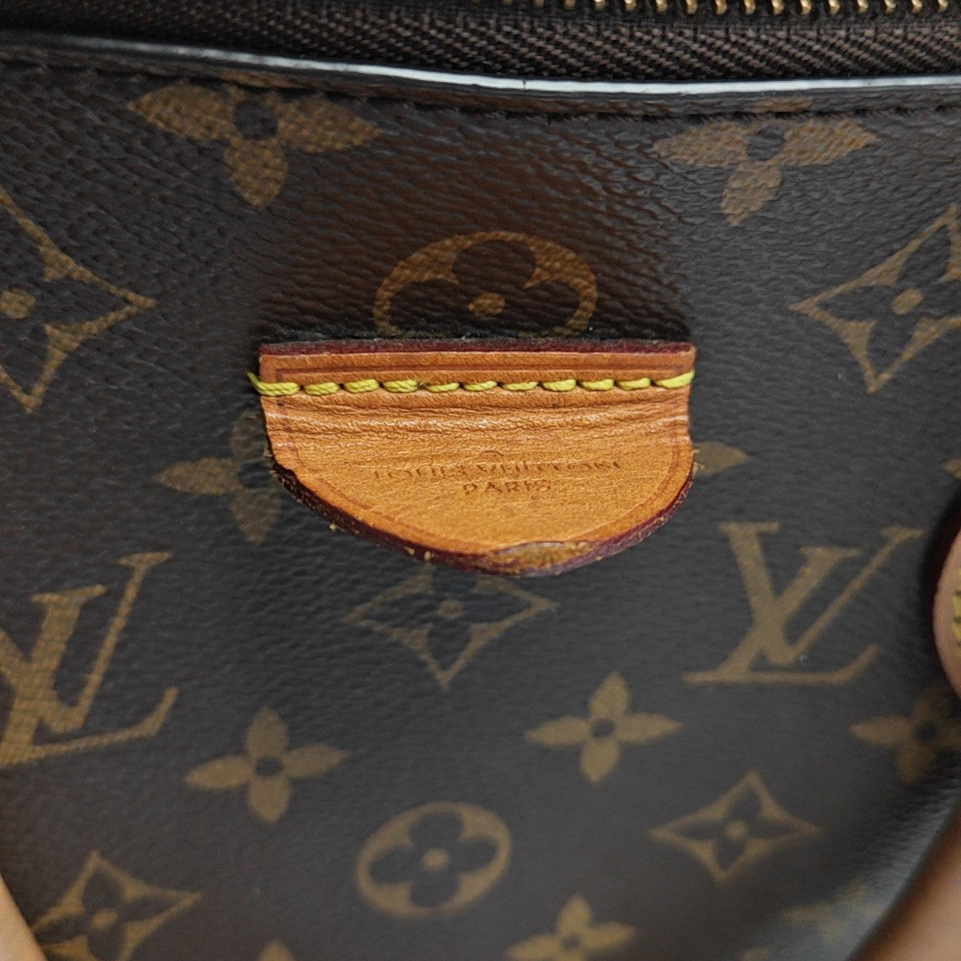 RIVOLI MM Monogram Coated Canvas Brown