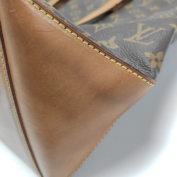 PIANO Monogram Coated Canvas Brown