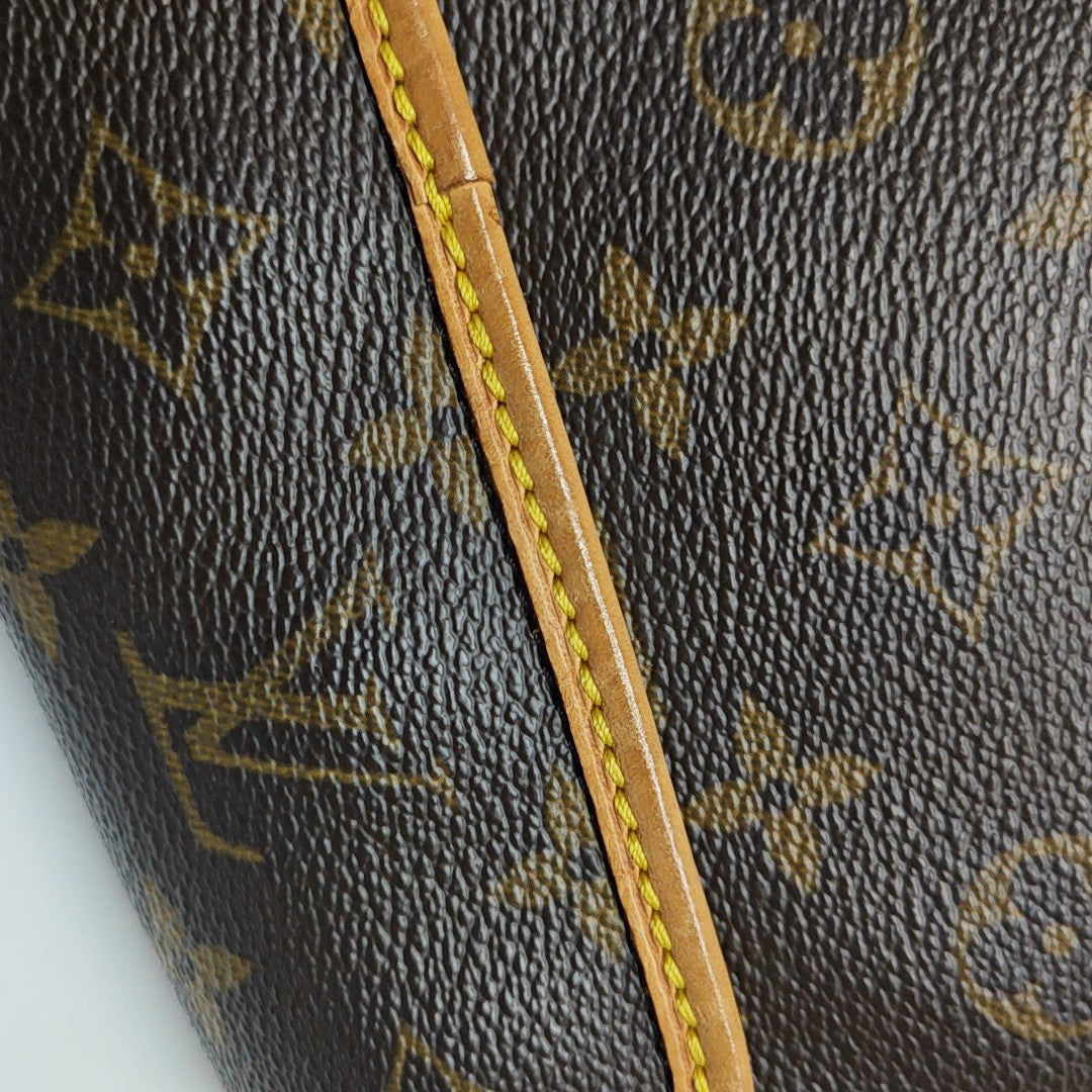 TIKAL Monogram Coated Canvas Brown