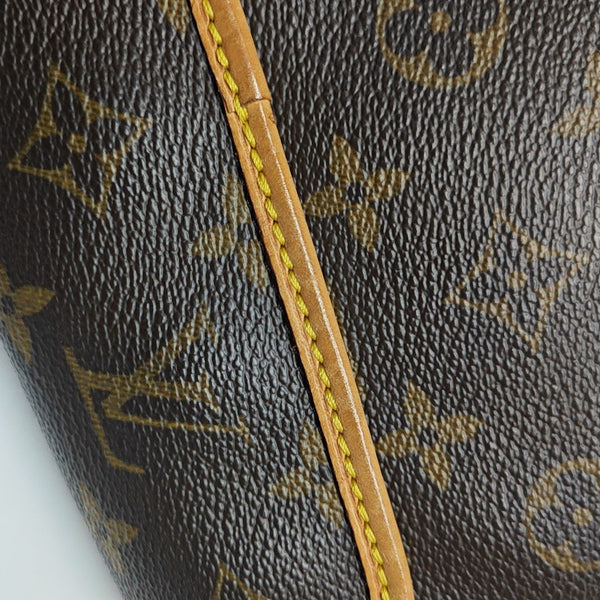 TIKAL Monogram Coated Canvas Brown