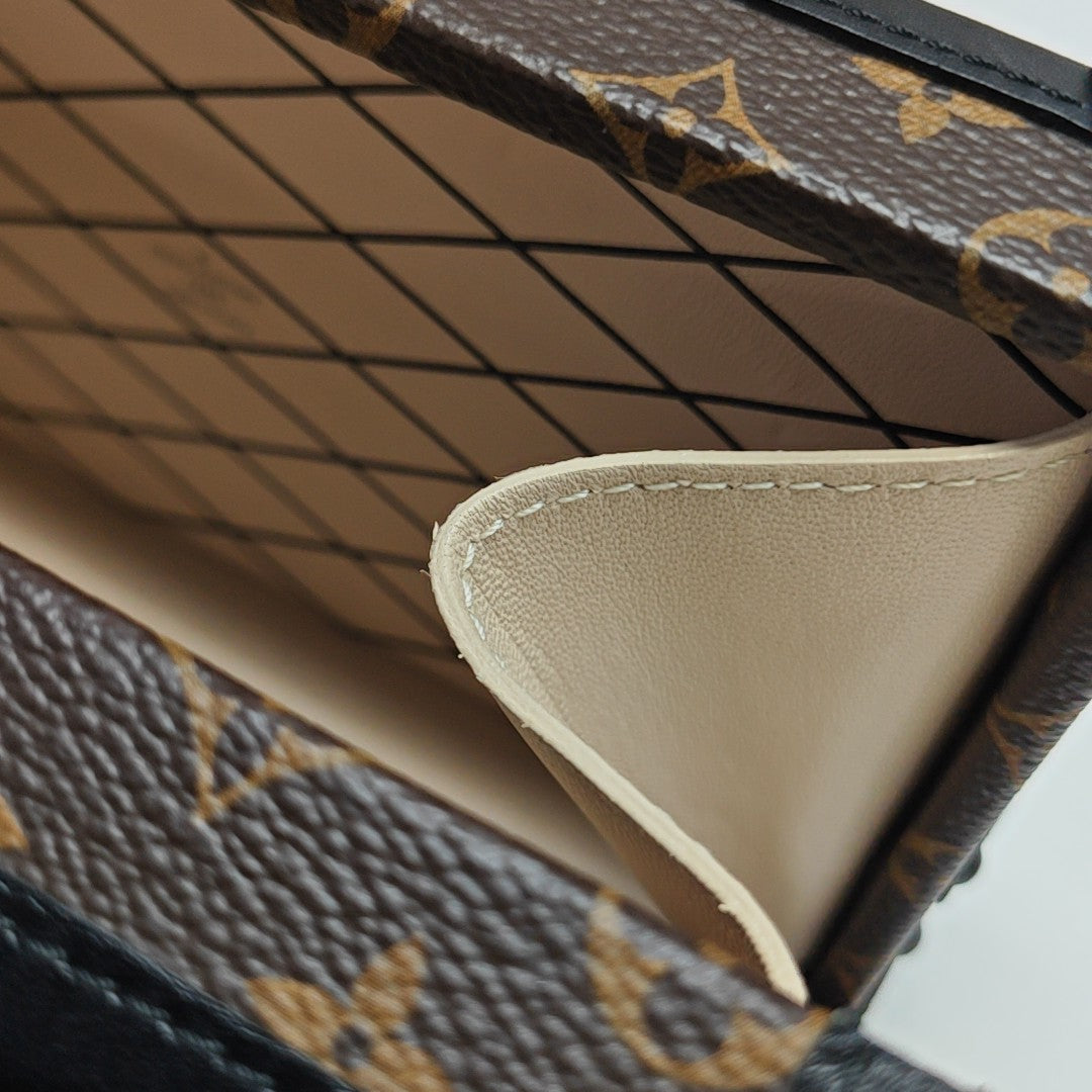 PETITE MALLE Monogram Coated Canvas Brown