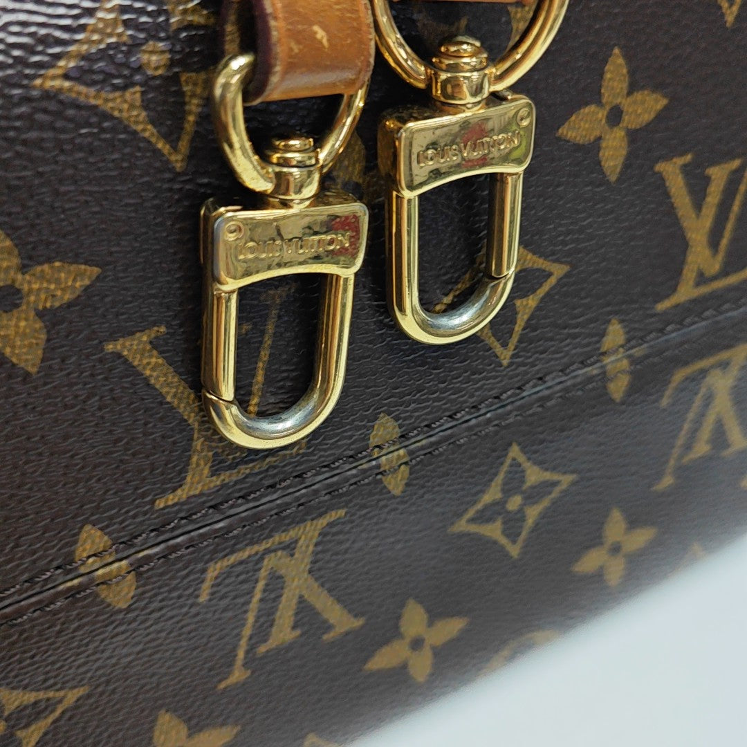 TURENNE Monogram Coated Canvas Brown