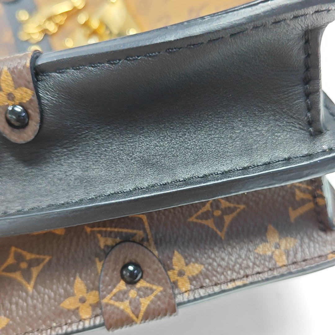 TRUNK Monogram Coated Canvas Brown