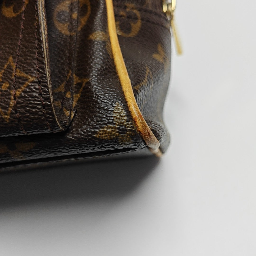 MANHATTAN PM Monogram Coated Canvas Brown