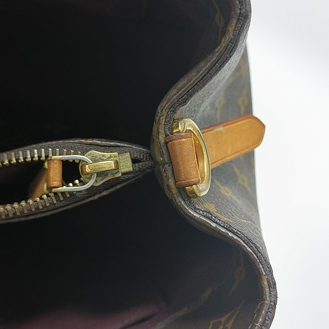 MONTAIGNE GM Monogram Coated Canvas Brown