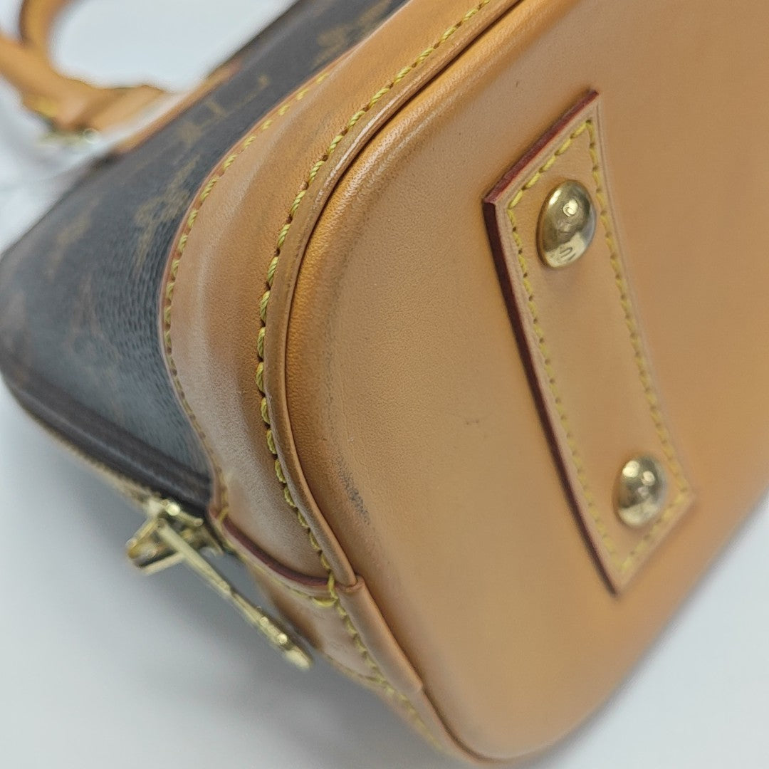 ALMA BB Monogram Coated Canvas Brown