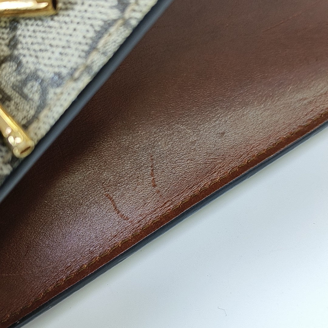 Padlock Small Monogram Coated Canvas Beige