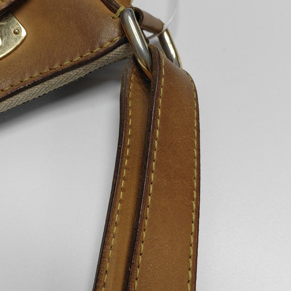 LV × TM GRETA Monogram Coated Canvas Black
