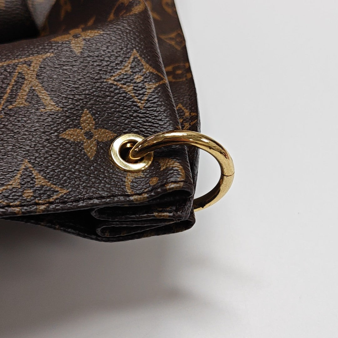 MÉTIS Monogram Coated Canvas Brown