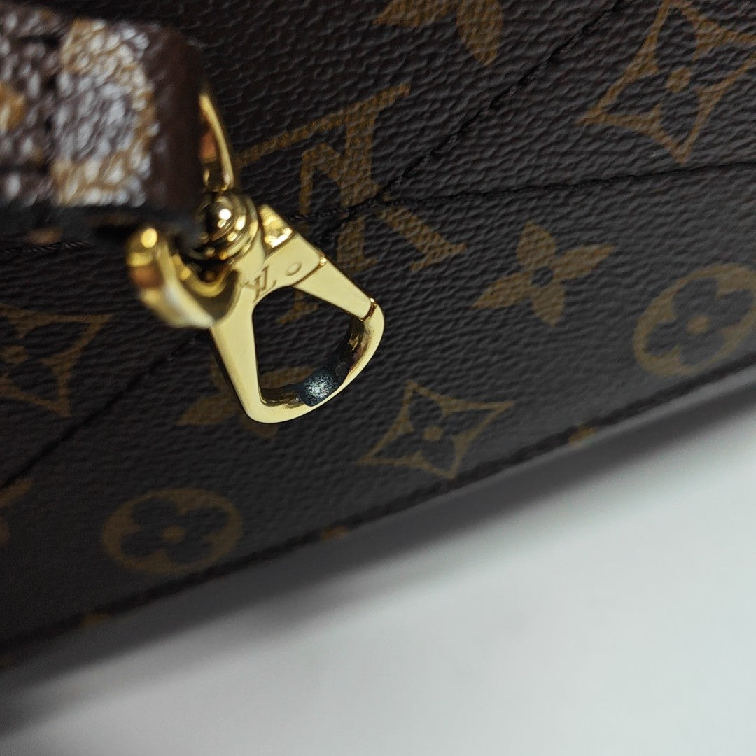 MONTAIGNE Monogram Coated Canvas Brown