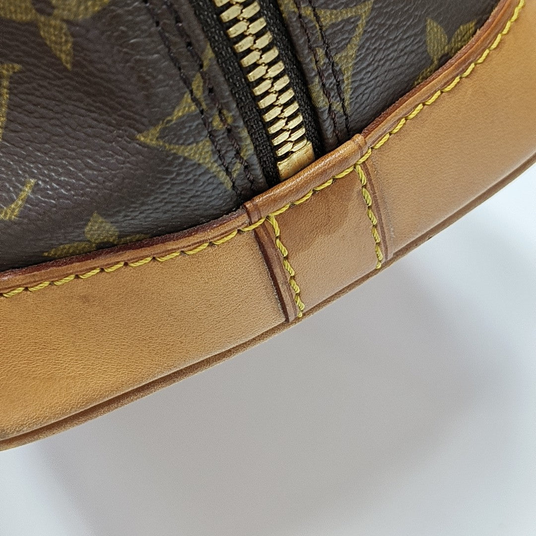 ALMA PM Monogram Coated Canvas Brown