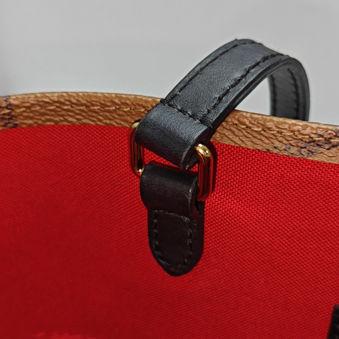 ONTHEGO MM Monogram Coated Canvas Brown