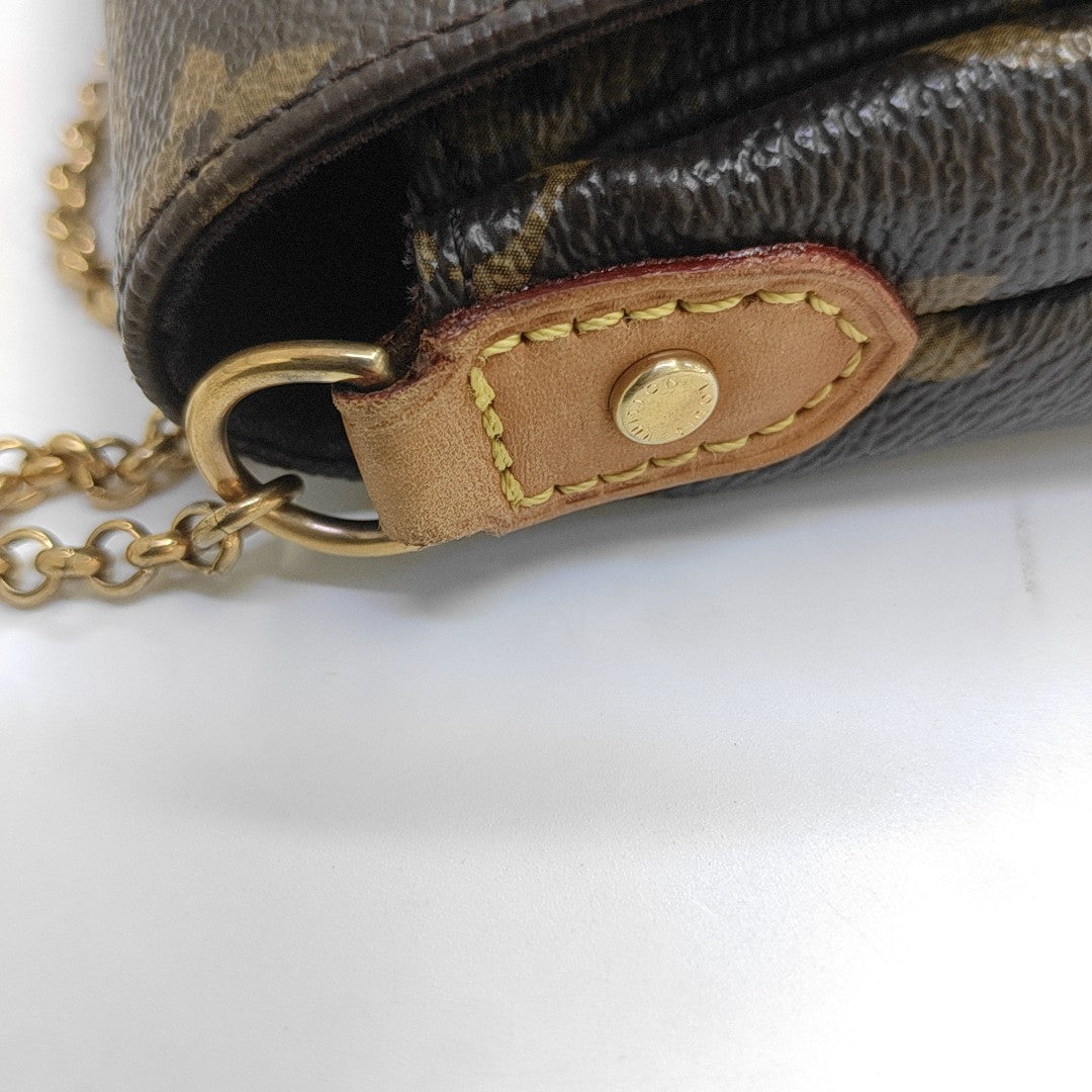 FAVORITE PM Monogram Coated Canvas Brown
