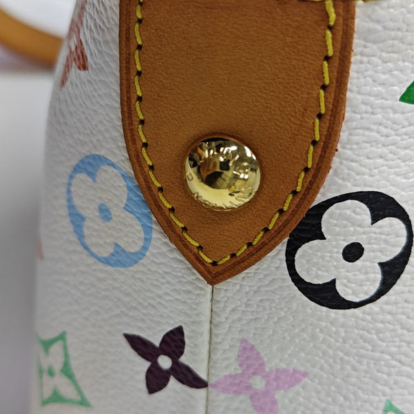 LV × TM ELIZA Monogram Coated Canvas White