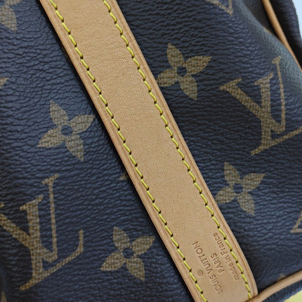 SPEEDY 25 Monogram Coated Canvas Brown