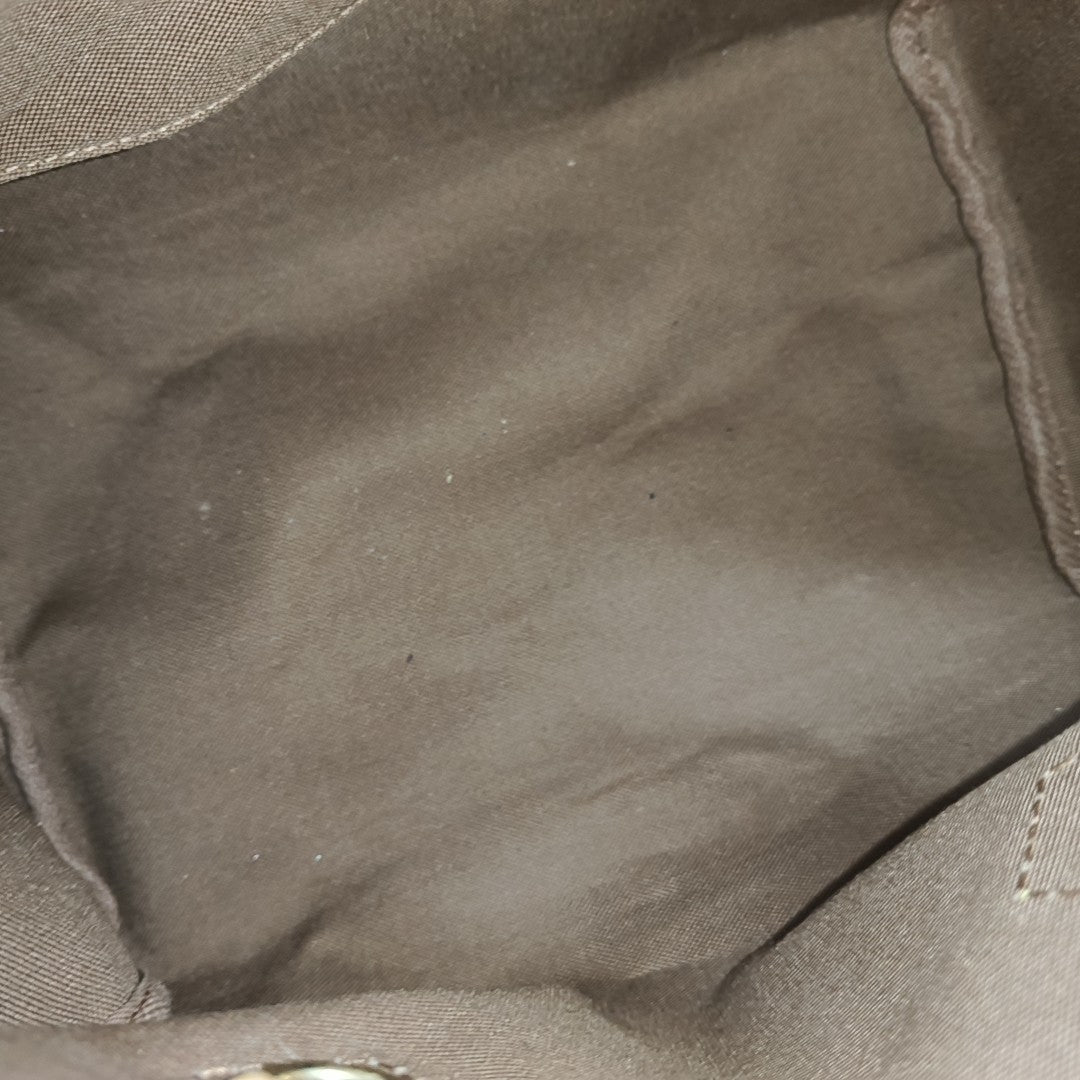 SPEEDY 25 Monogram Coated Canvas Brown