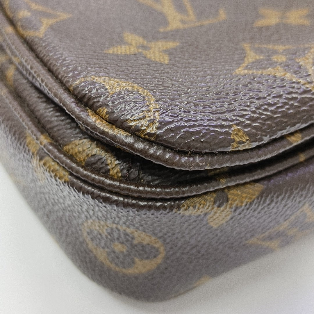 MÉTIS MM Monogram Coated Canvas Brown