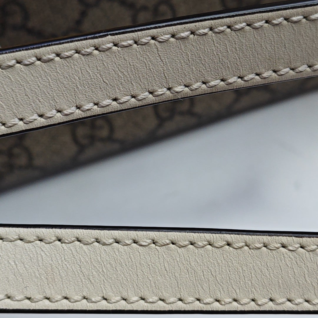 Padlock Small Monogram Coated Canvas Beige