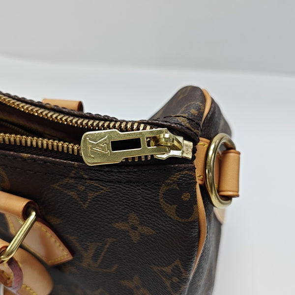 SPEEDY 25 Monogram Coated Canvas Brown