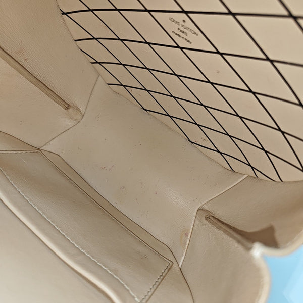 BOITE CHAPEAU PM Monogram Coated Canvas Brown