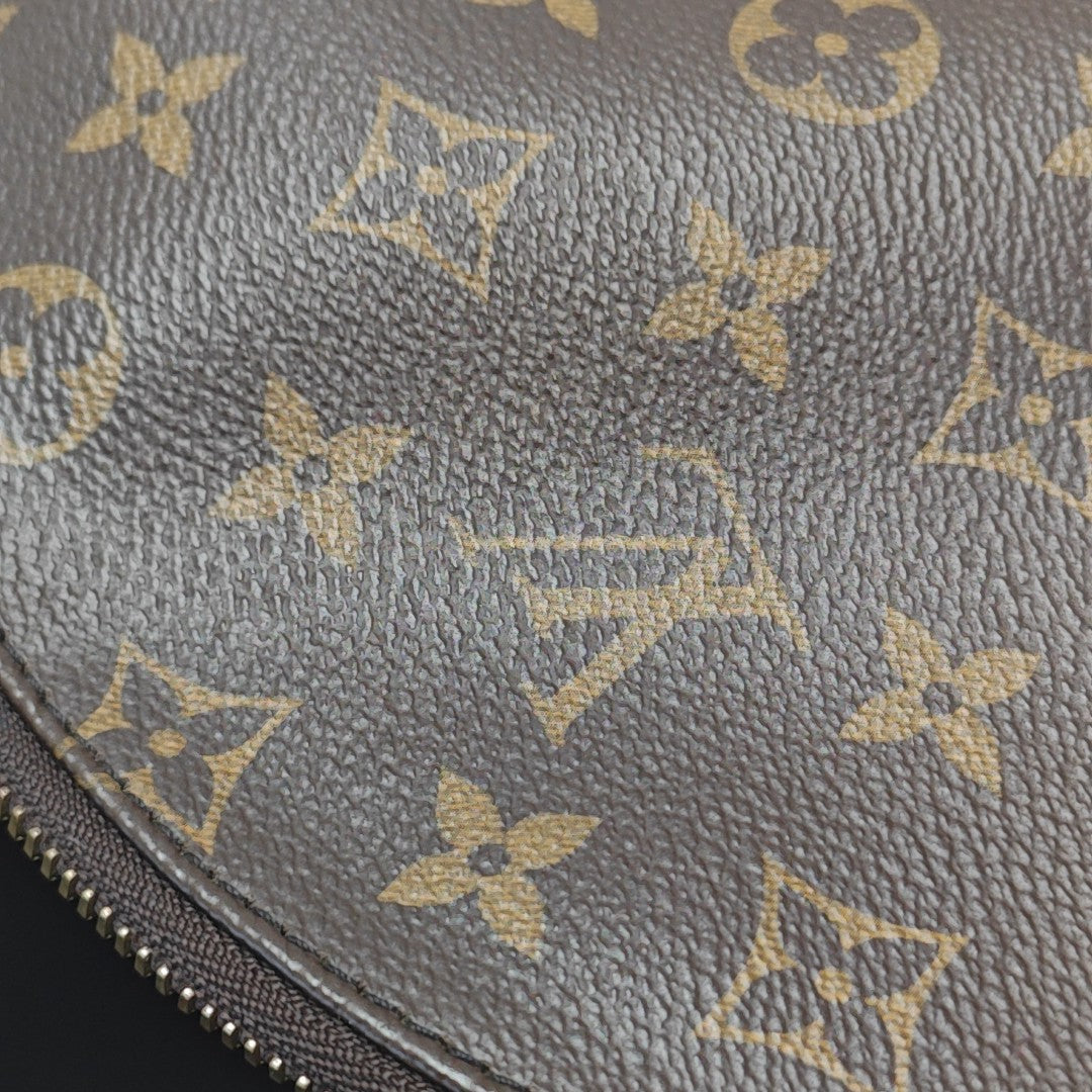 Monogram Coated Canvas Backpack Brown