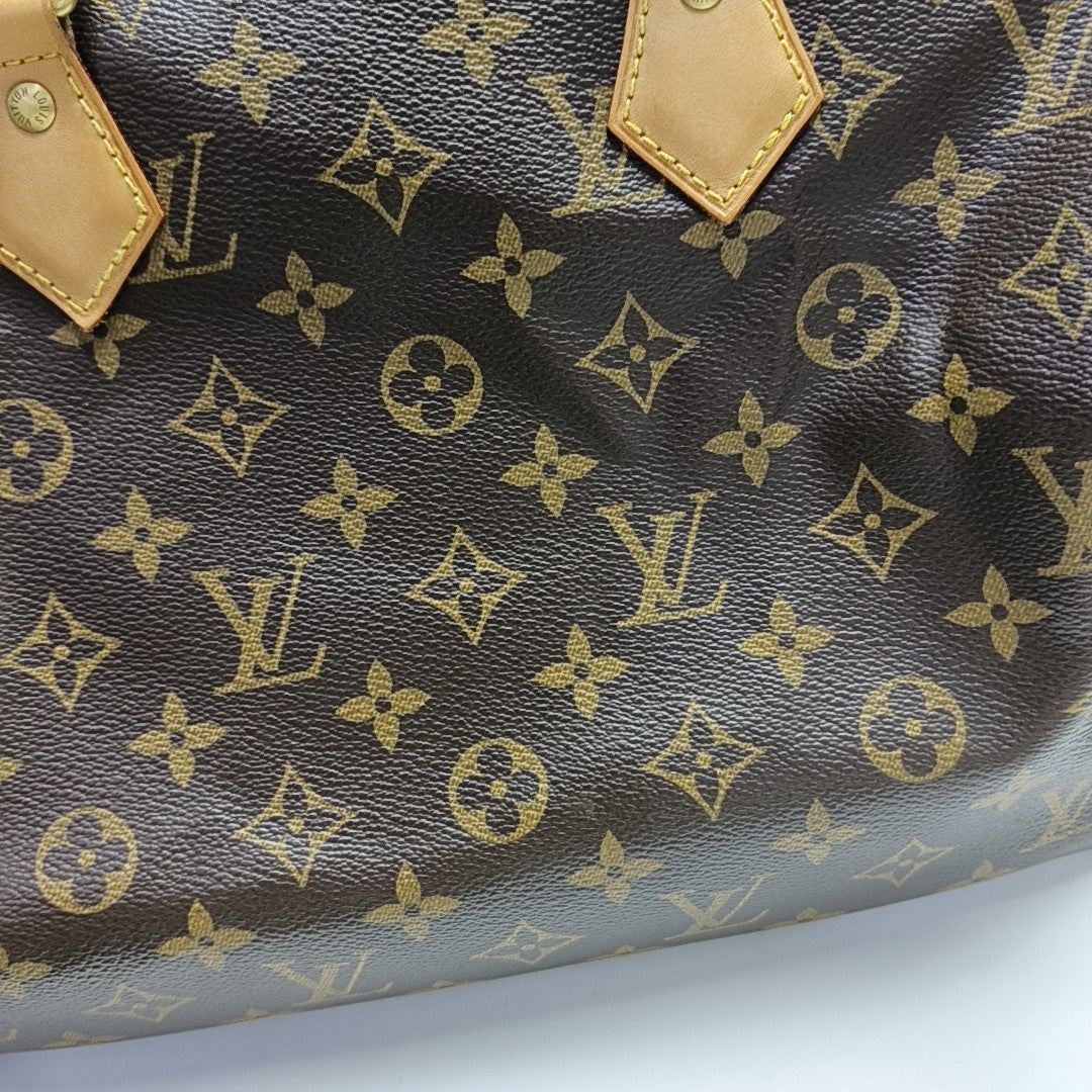 SPEEDY 30 Monogram Coated Canvas Brown