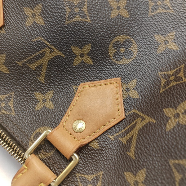 SPEEDY 25 Monogram Coated Canvas Brown