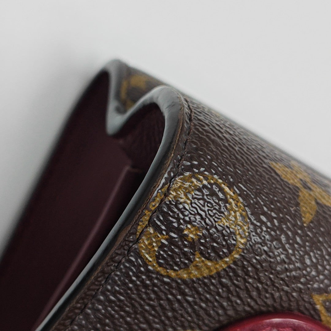 VICTOIRE Monogram Coated Canvas Brown