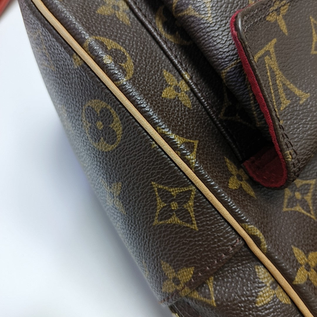 EXCENTRI-CITE Monogram Coated Canvas Brown
