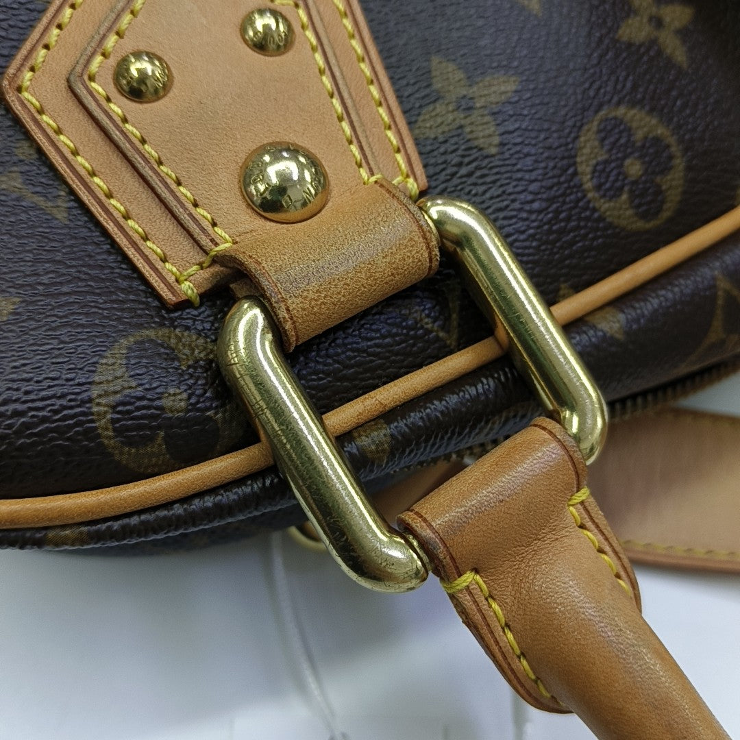 MANHATTAN GM Monogram Coated Canvas Brown