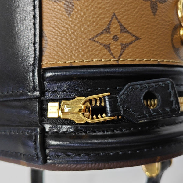 CANNES PM Monogram Coated Canvas Brown