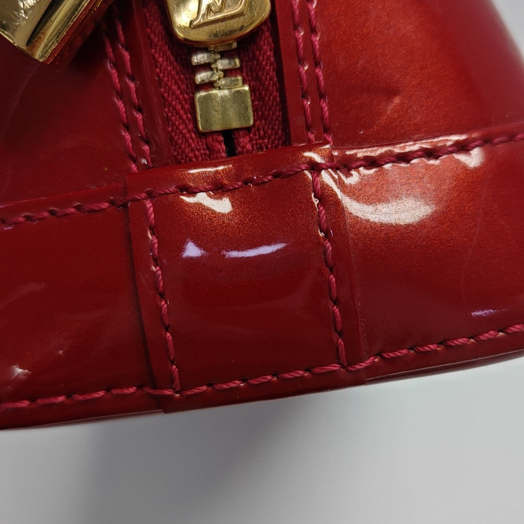 ALMA BB Monogram Patent Leather Red
