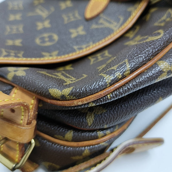SAUMUR Monogram Coated Canvas Brown